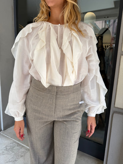Blusa volant
